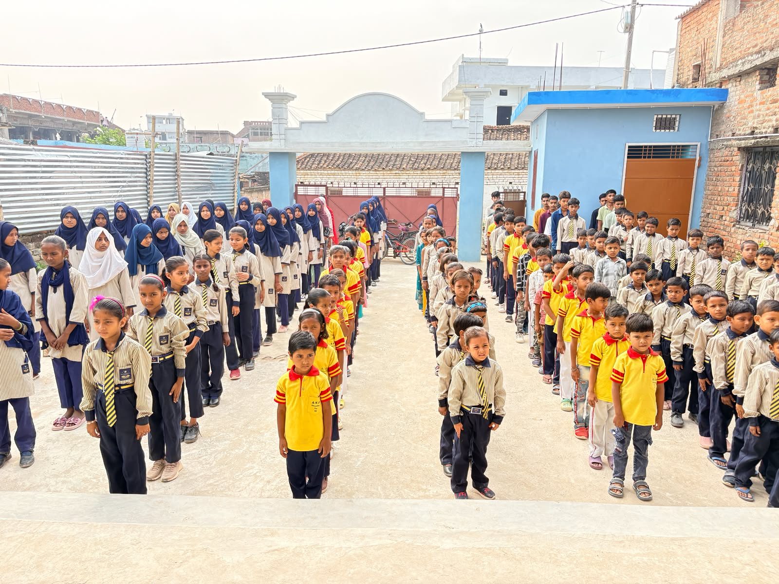 Students of Aliza Knowledge Foundation school at morning assembly in Darbhanga, Bihar